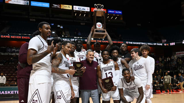 Mississippi State Bulldogs lifts the trophy and celebrates the win against Northwestern Wildcats at Mohegan Sun Arena.
